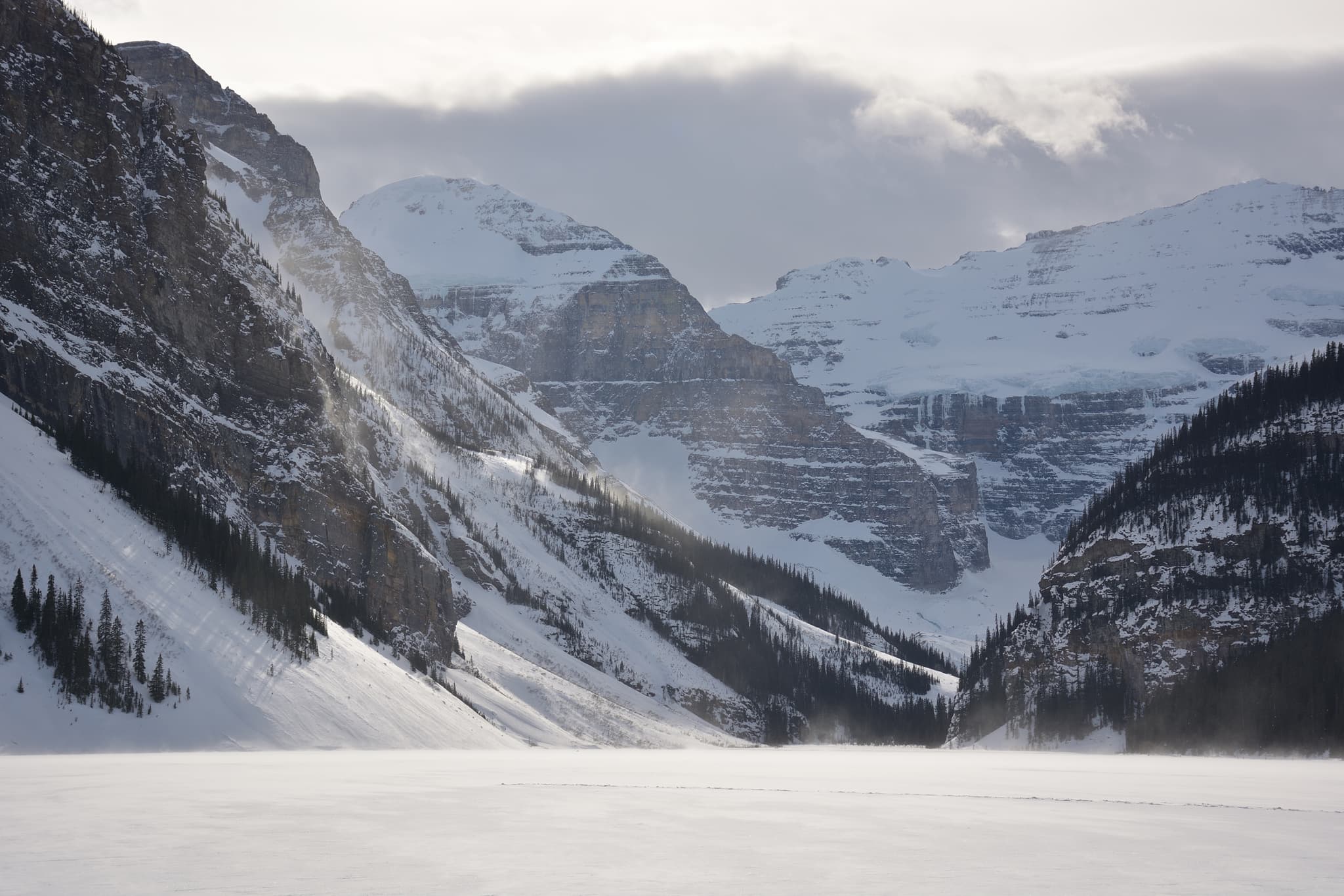Mount Victoria behind the frozen Lake Louise